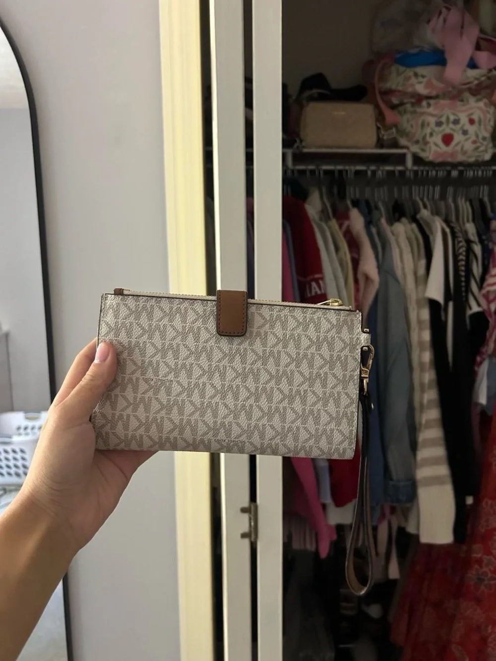 Michael Kors Cream Logo Pattern Wristlet with Brown Trim